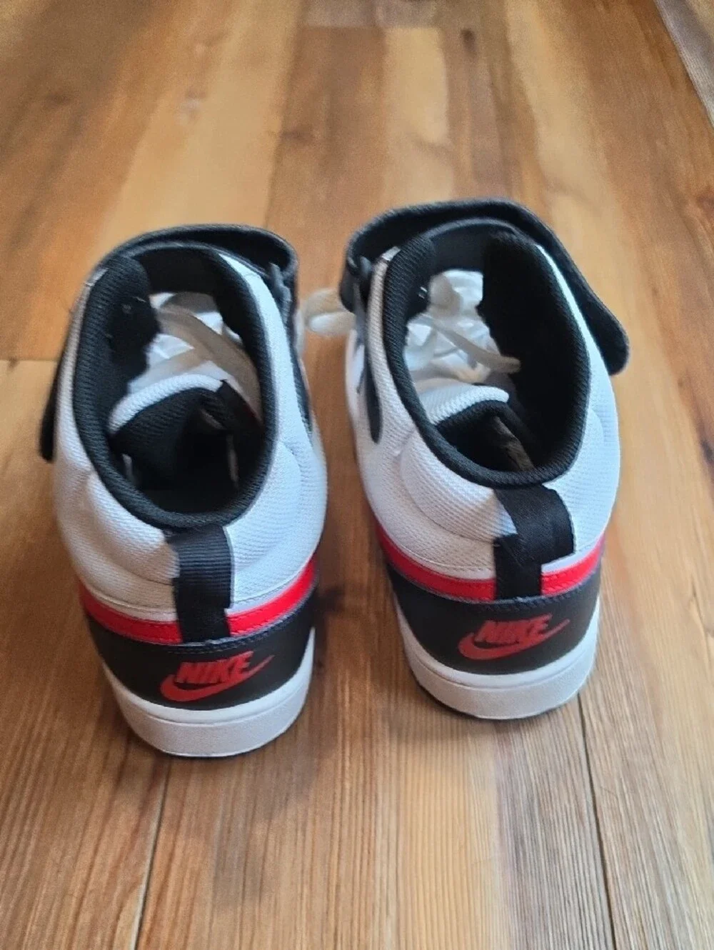 Nike Kids White High-Top Sneakers with Black and Red Accents